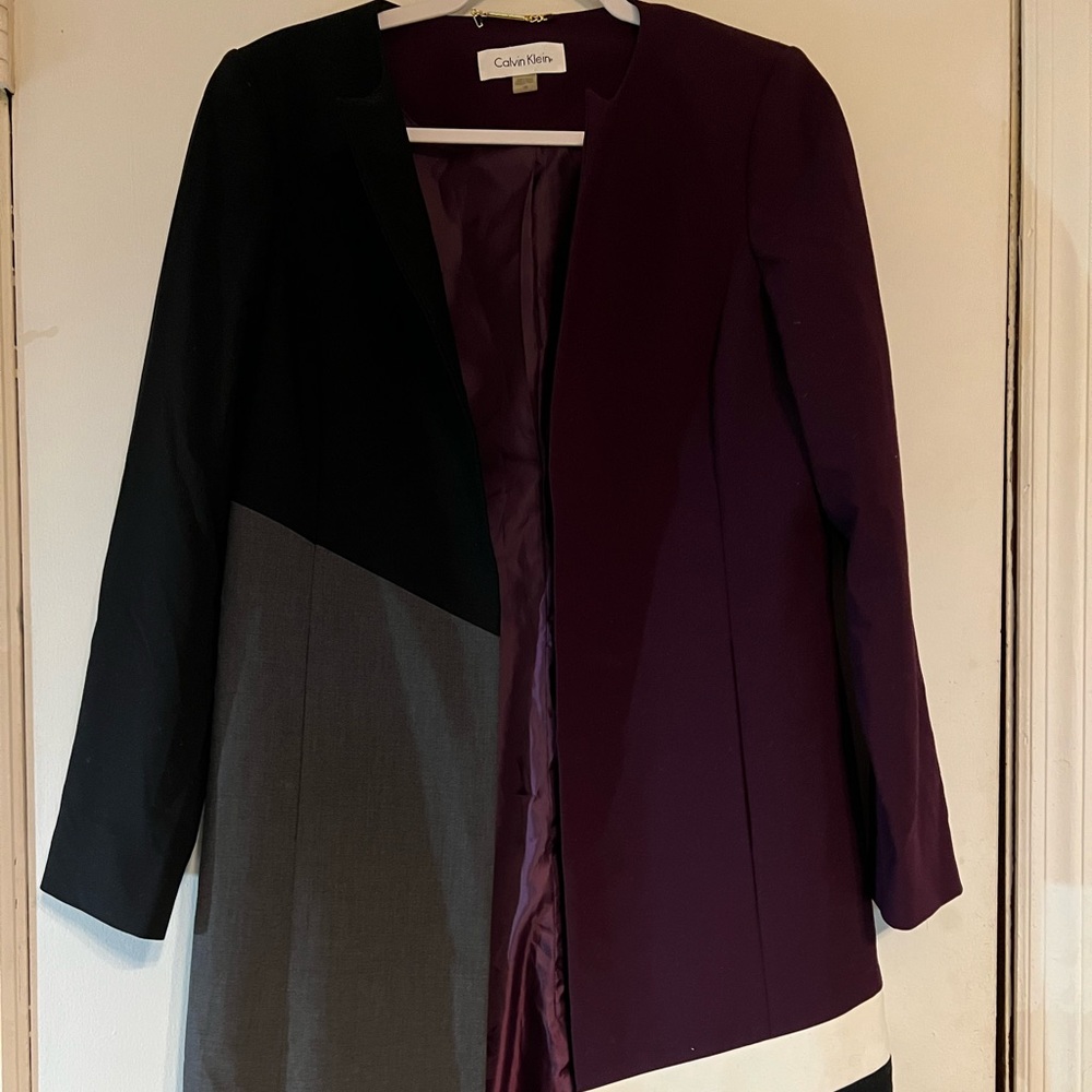 Calvin Klein jacket.  Size 10. Burgundy black and white with a satin lining.